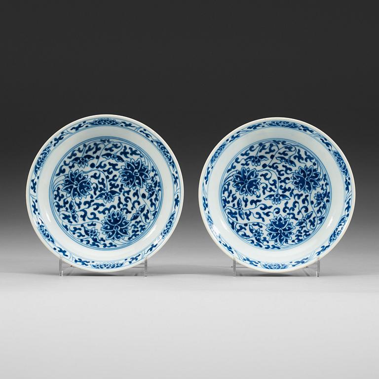 A pair of blue and white lotus dishes, Qing dynasty, 19th century with Daoguang seal mark.