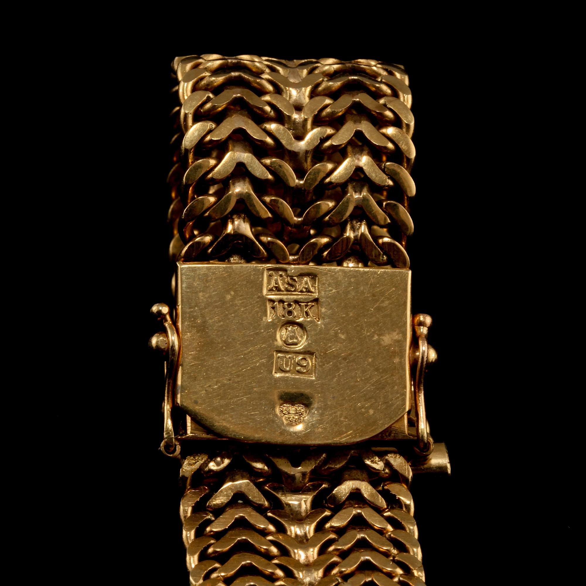 KLOCKLÄNK, 18k guld, ÄSA Ädelsmycken, Stockholm, 1970. Vikt 34 g.