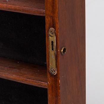 A Chinese 20th century hardwood wall cabinet.