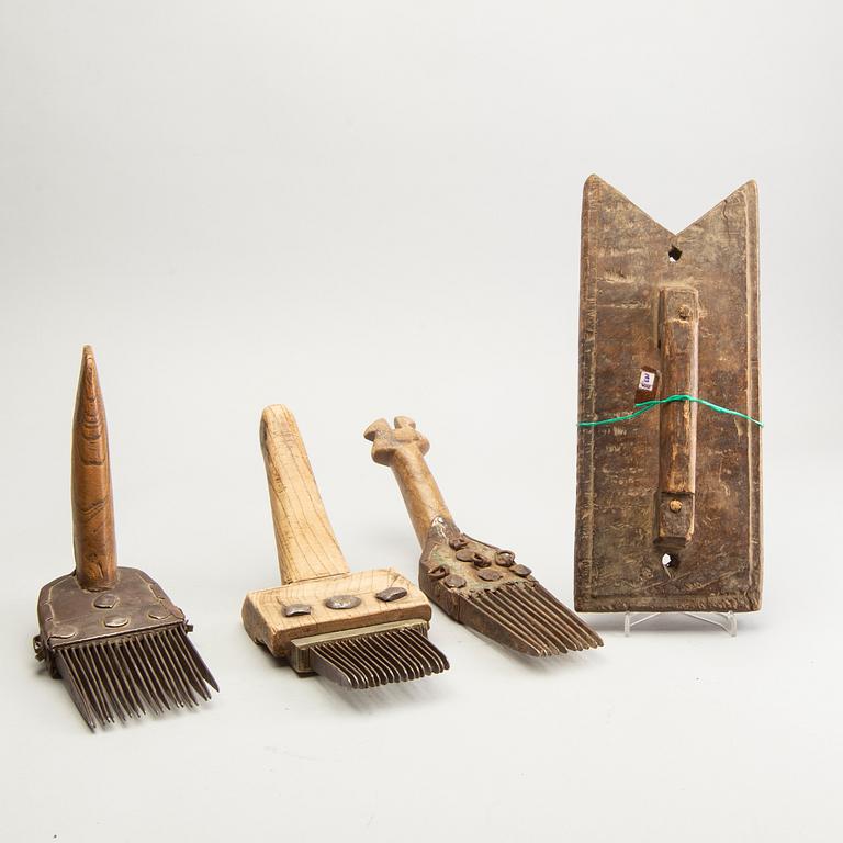 A set of 3 Persian carpet weavers combs and a wood printing block, 20th Century.