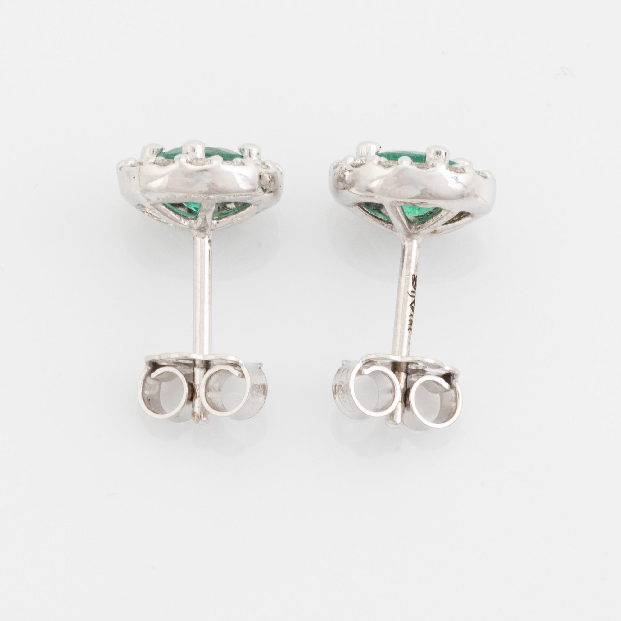Emerald and brilliant cut diamond earrings.