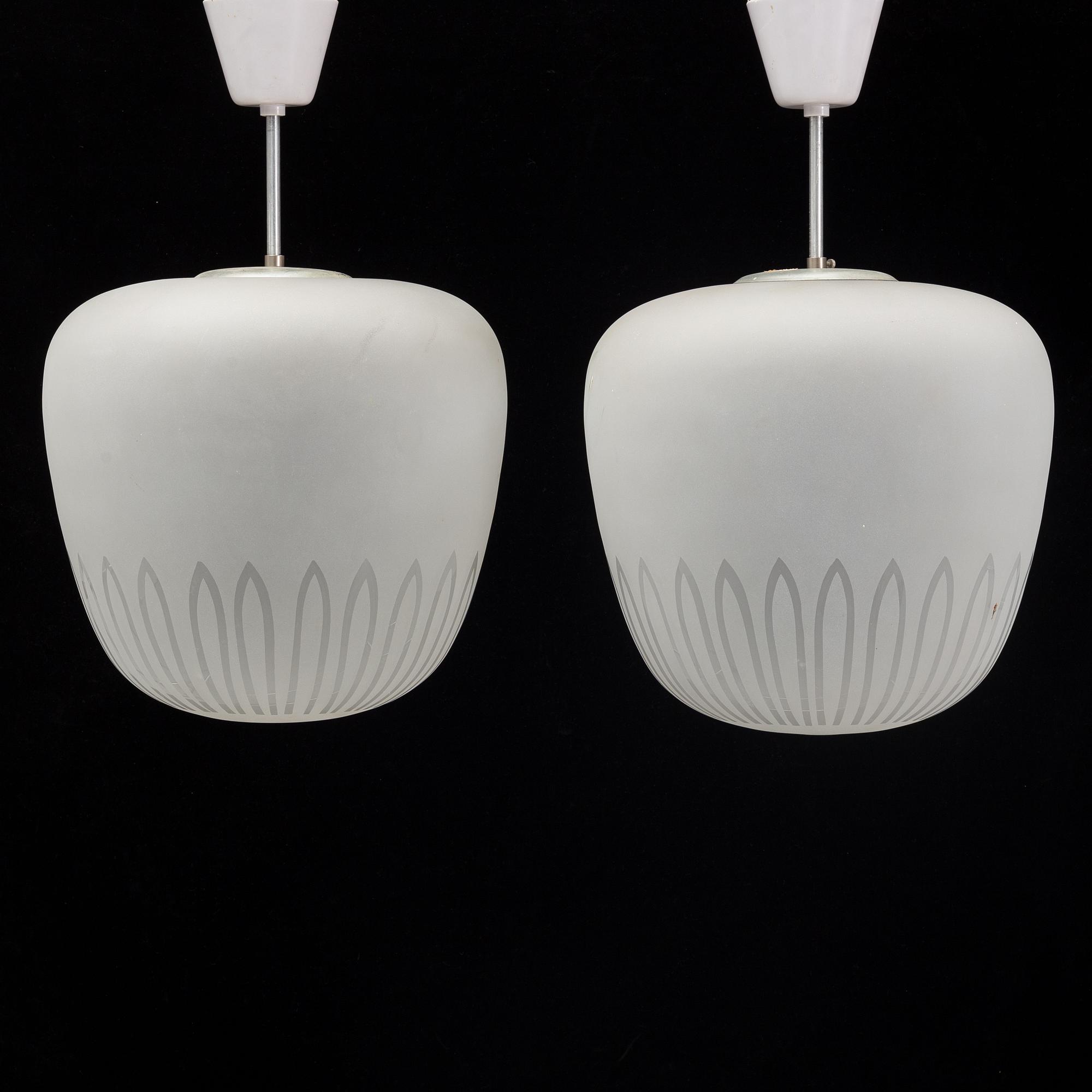 A pair of 1940's Swedish medern ceiling lamps.