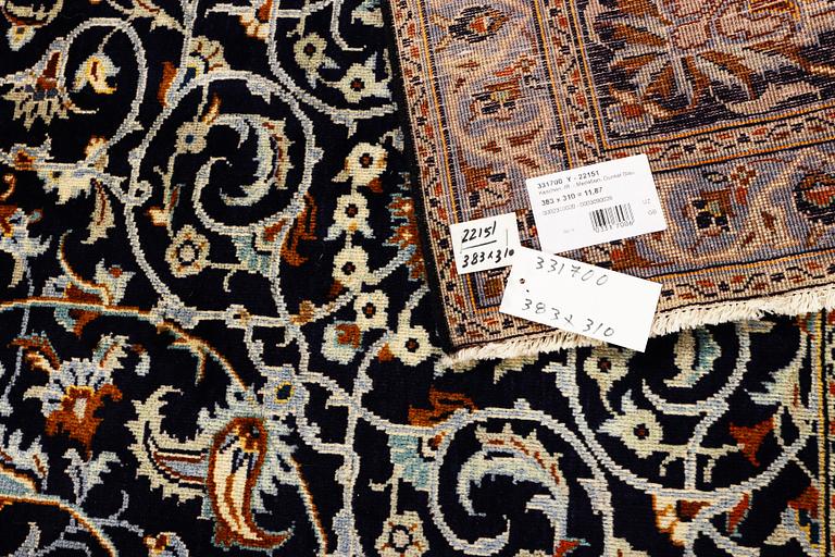 A Kashan carpet, c. 383 x 310 cm.