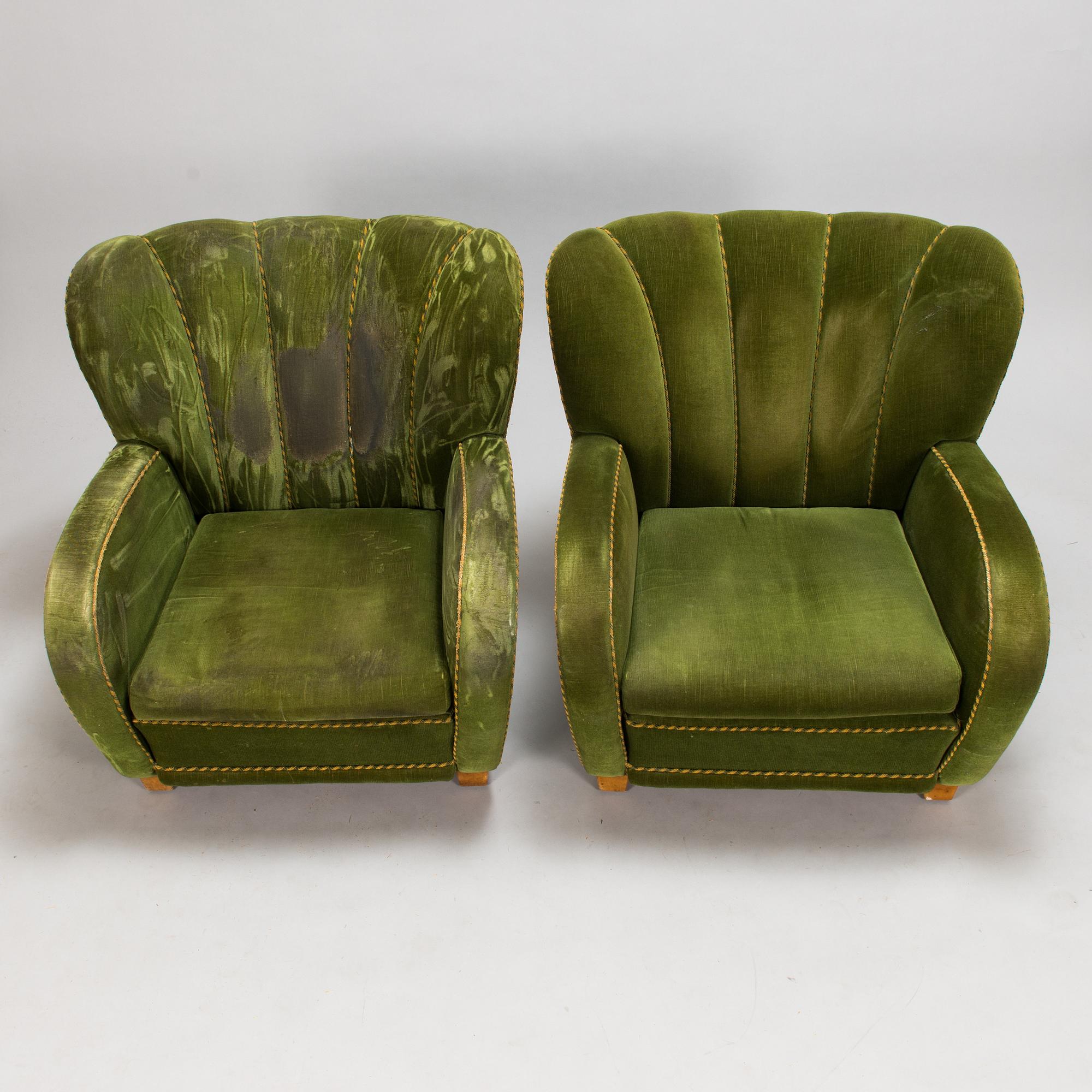 A pair of 1950s armchairs.