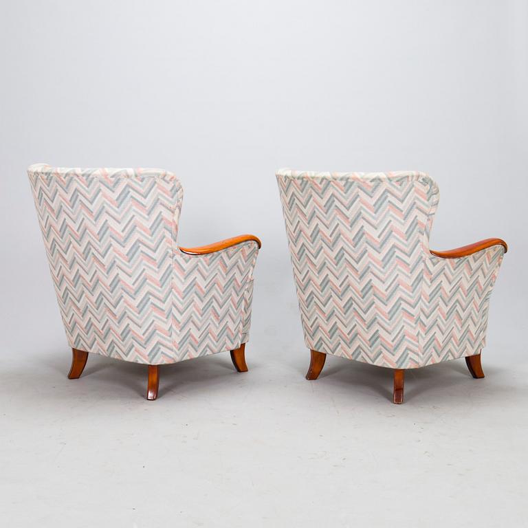 A pair of armchairs, mid-20th century.