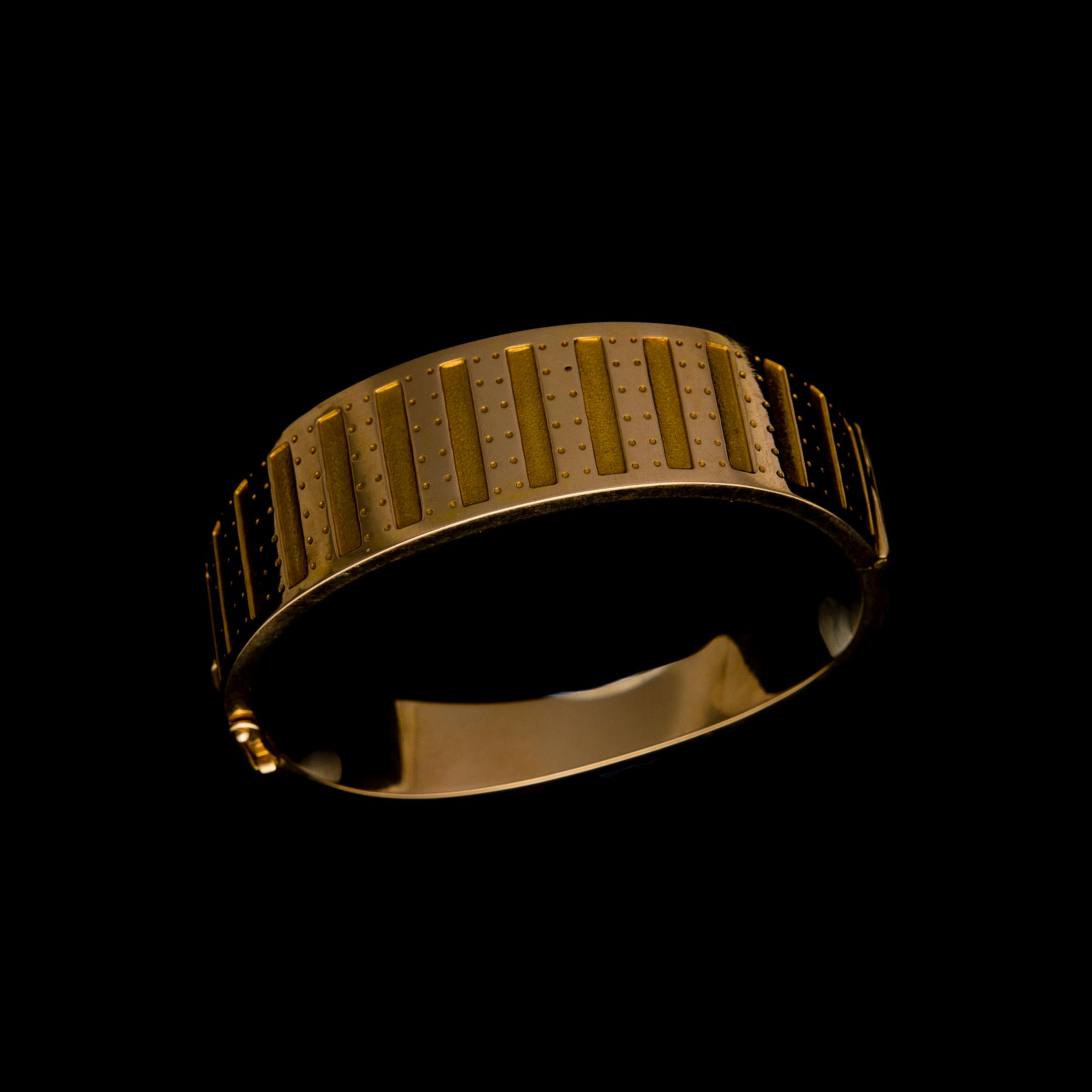 ARMBAND, "Metsäpirtti" 18K guld, Kalevala Koru 1962. Original etui. Vikt 44,5 g.