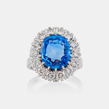 1231. A 6.58 ct untreated Ceylon sapphire and brilliant-cut diamond ring.