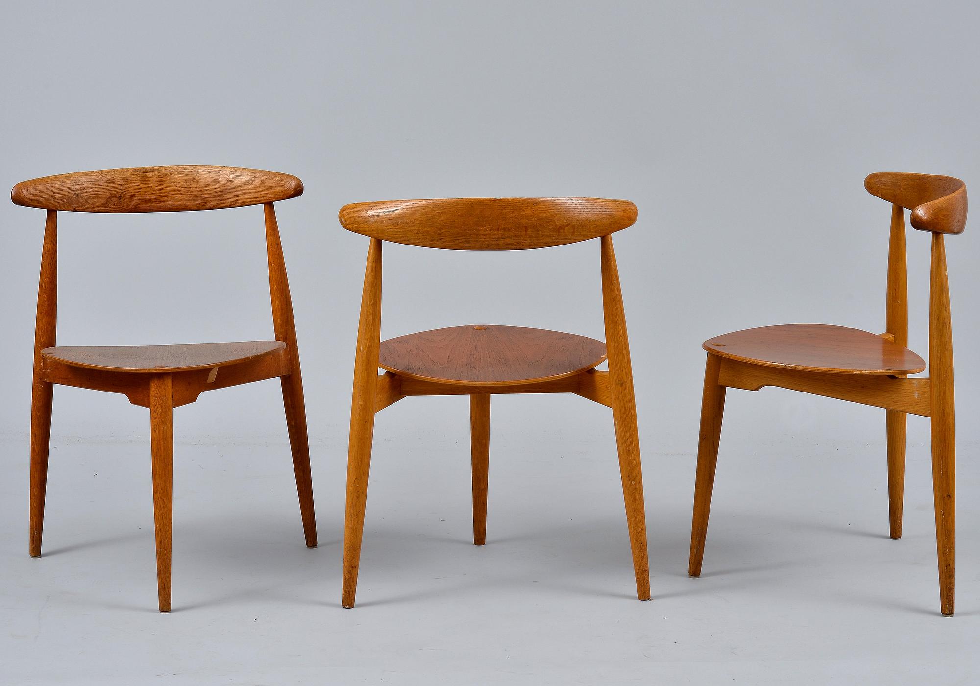 Hans J. Wegner, A SET OF SIX CHAIRS AND A TABLE, The Heart Chair. Beech and oak, teak on seats.