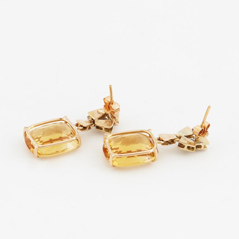 Faceted citrines and diamond earrings.