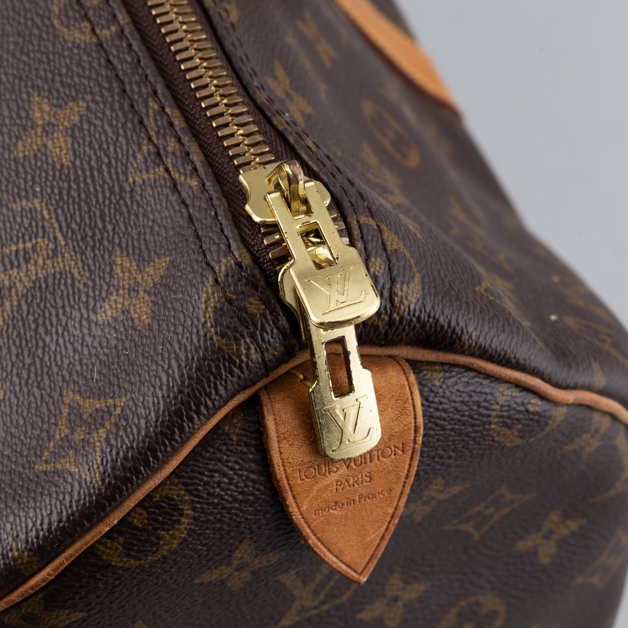 Louis Vuitton,.