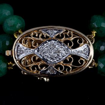 HALSSMYCKE, fasettslipade beryller, låset av guld 14K, små diamanter. 1900-talets slut.