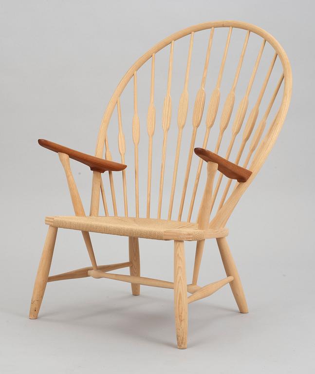 A Hans J Wegner ash and teak 'Peacock chair', by PP Møbler, Denmark.