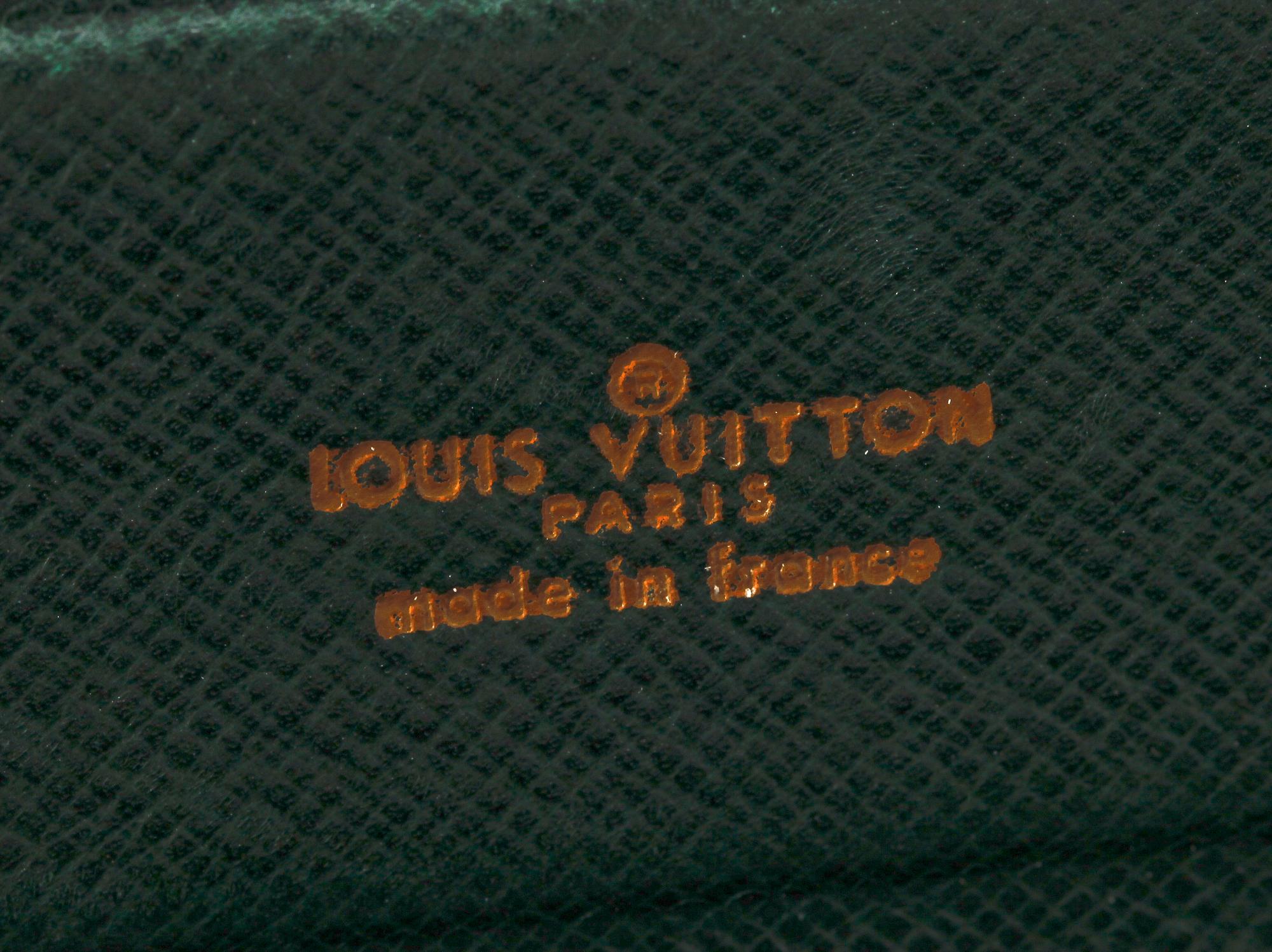 A 1990s naturel cowhide leather brief cse by Louis Vuitton.