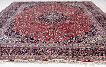 An Old Keshan carpet, approx. 400 x 299 cm.