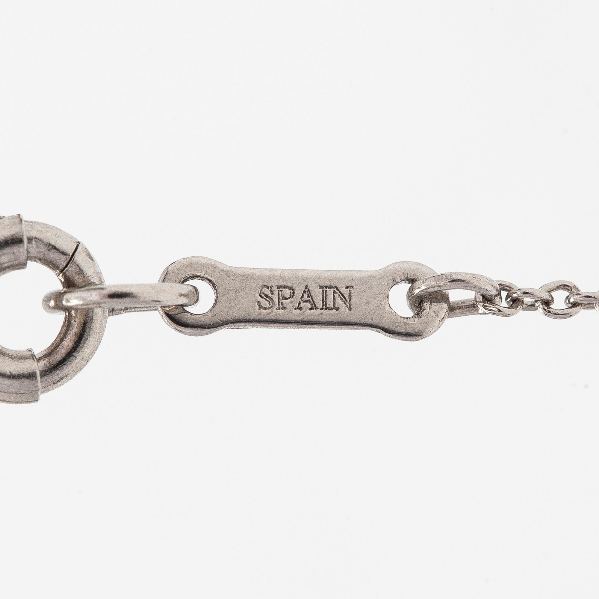 Tiffany & Co, Elsa Peretti, kaulakoru, risti, platinaa.