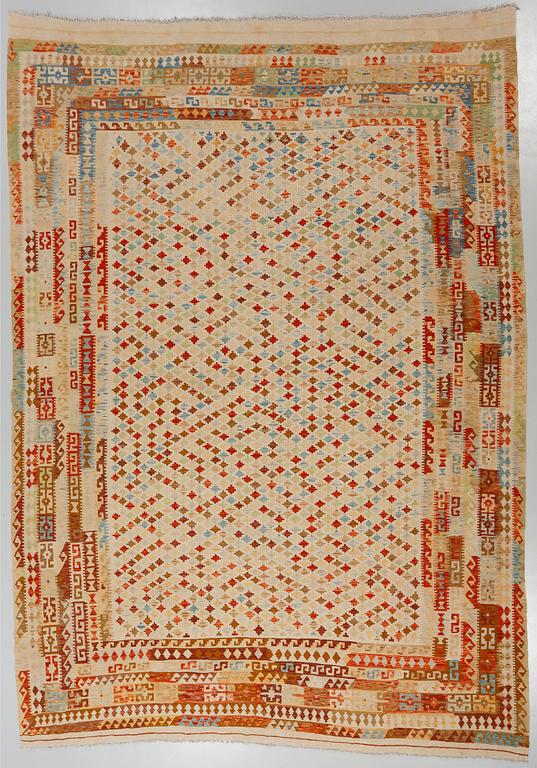 A kelim rug, 400 x 315 cm.