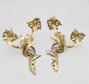 APPLIQUER, ett par, rokokostil, 1800/1900-tal.