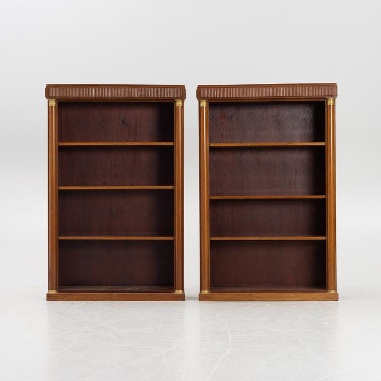 Bookcases, a pair, Empire style, first half of the 20th century.