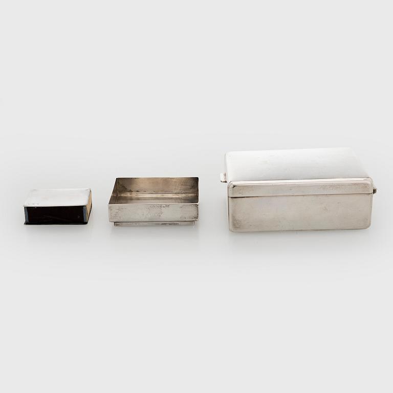 A silver cigarette case, matchbox holder and small bowl, Sandrik, as well as 3 ashtrays, Czechoslovakia 1929-1945.