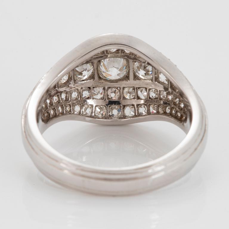 An 18K white gold ring set with old- and eight-cut diamonds.