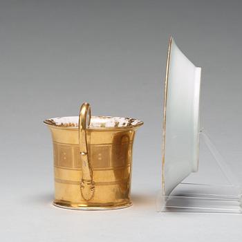 A Russian topograhical cup with saucer, Empire, early 19th Century.