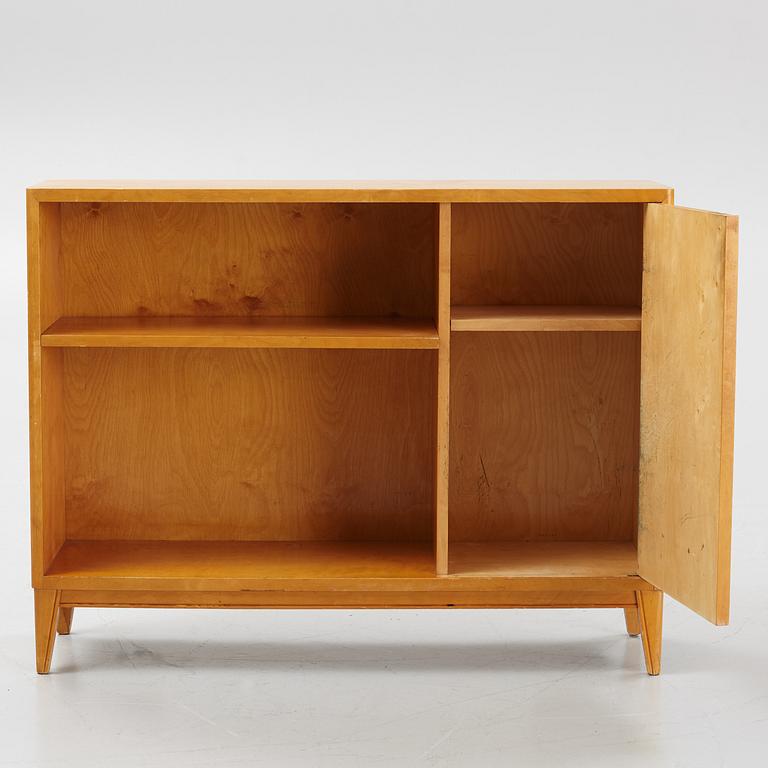 A birch bookcase with cabinet, 1930's/40's.