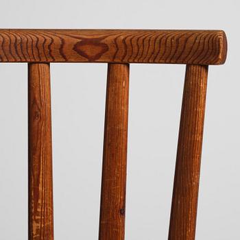 Axel Einar Hjorth, a set of three stained pine "Utö" chairs, Nordiska Kompaniet, Sweden, 1930s.