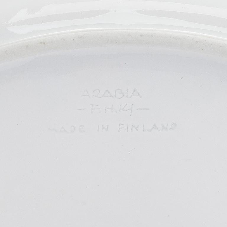 Friedl Holzer-Kjellberg, three porcelain candle holders and a "Helmi" plate, Arabia, 1970s.