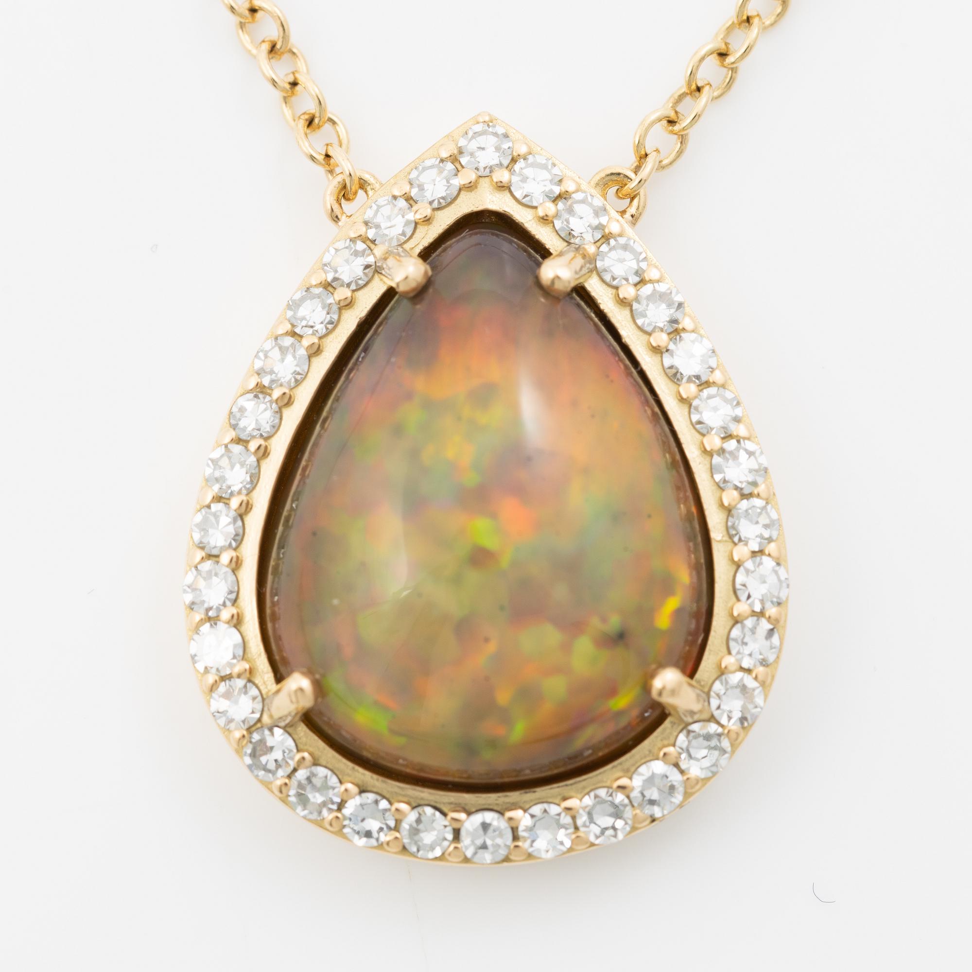 Necklace in 18K gold with a drop-shaped opal and octagon-cut diamonds.