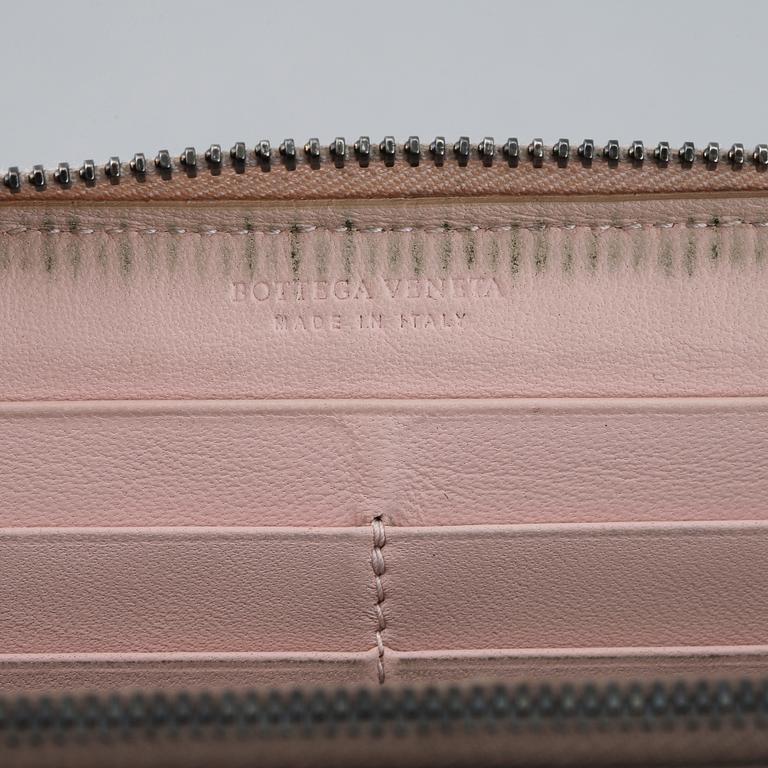 BOTTEGA VENETA, a intrecciato leather wallet.