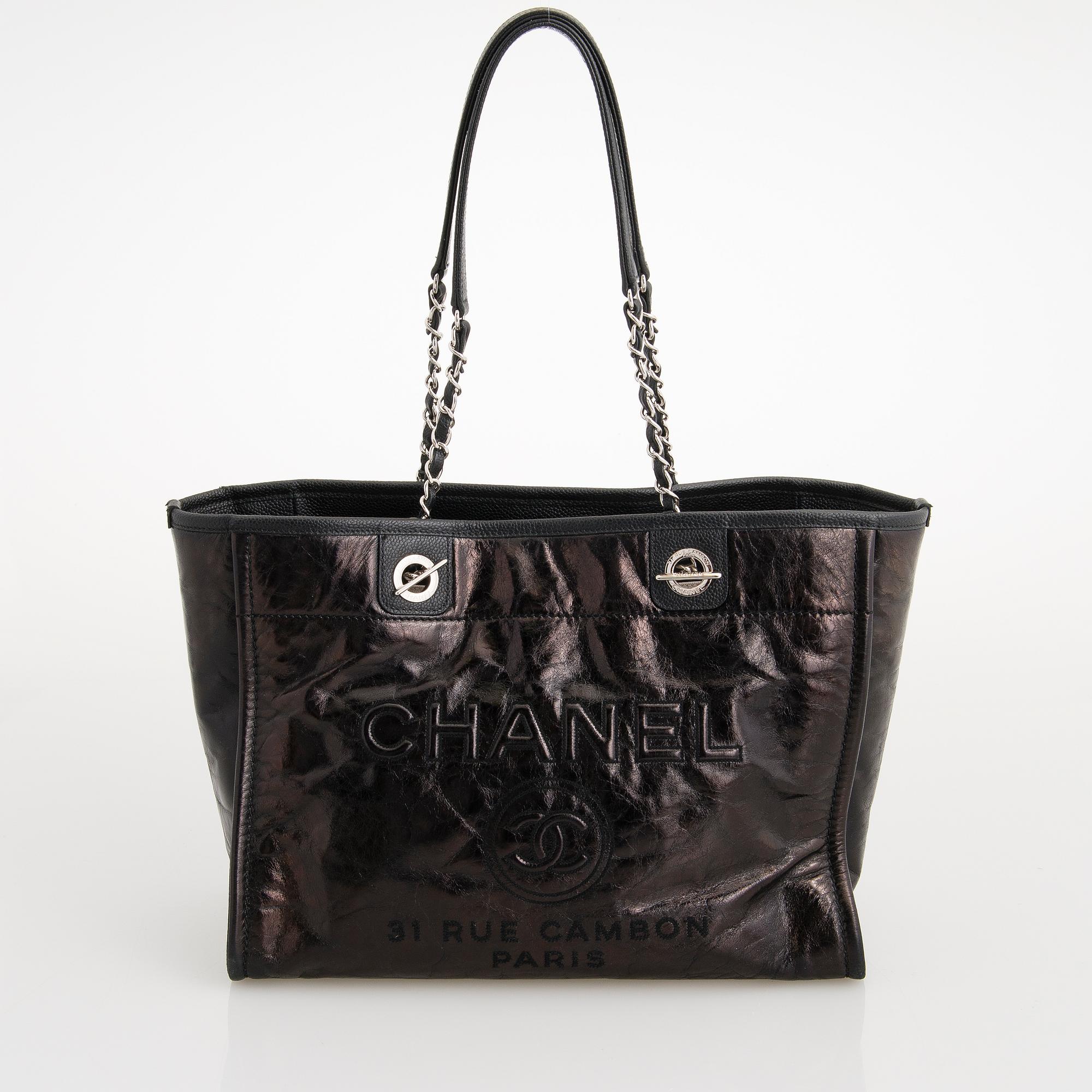 CHANEL, A Large Black Leather Shopping Bag.