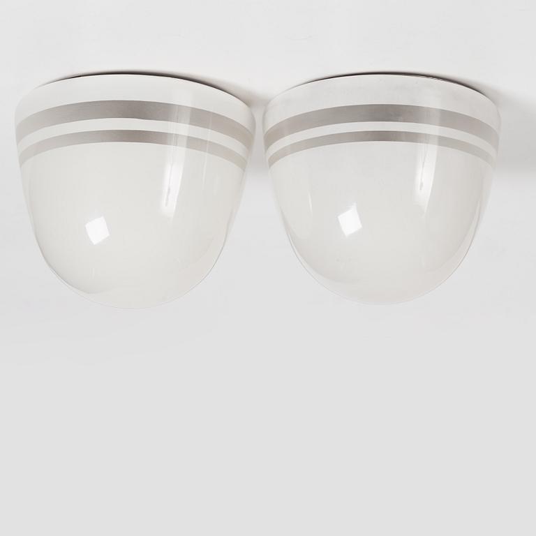 Harald Notini, a pair of ceiling lamps, version of model "10148", Arvid Böhlmarks Lampfabrik, 1930s.