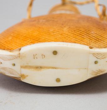 A Sami knife and bottle, Knut Dahlgren, Arvidsjaur, signed KD, second half of the 20th Century.