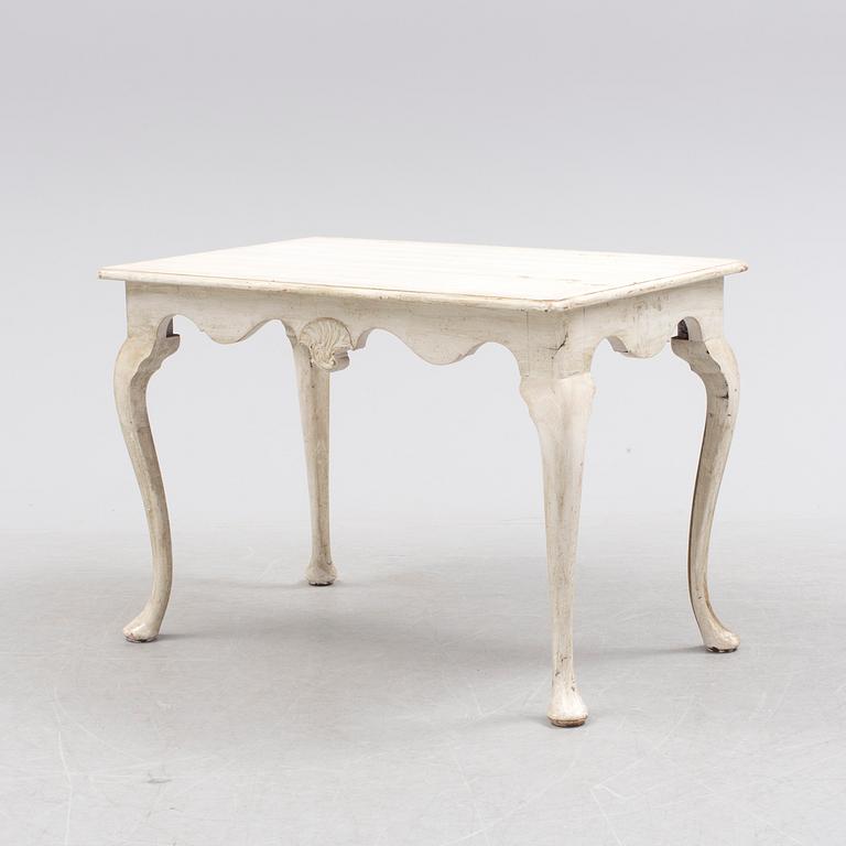 A first half of the 20th century rococo style table.