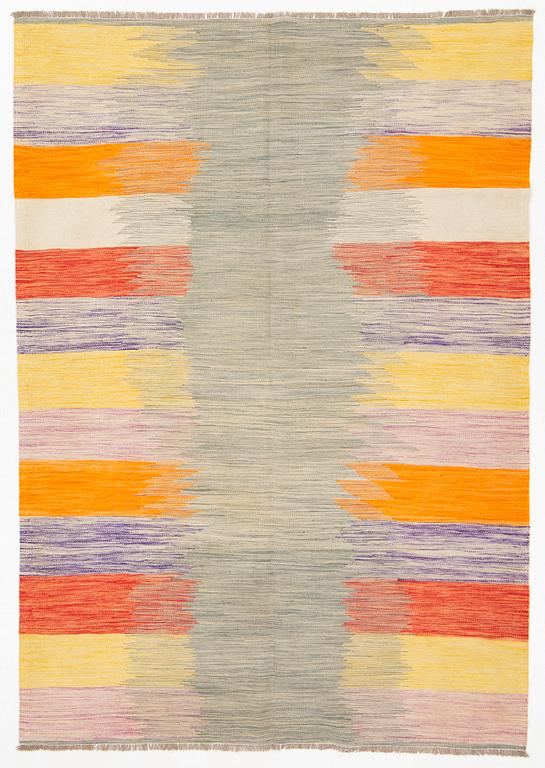 A kilim rug, ca 252 x 175 cm.
