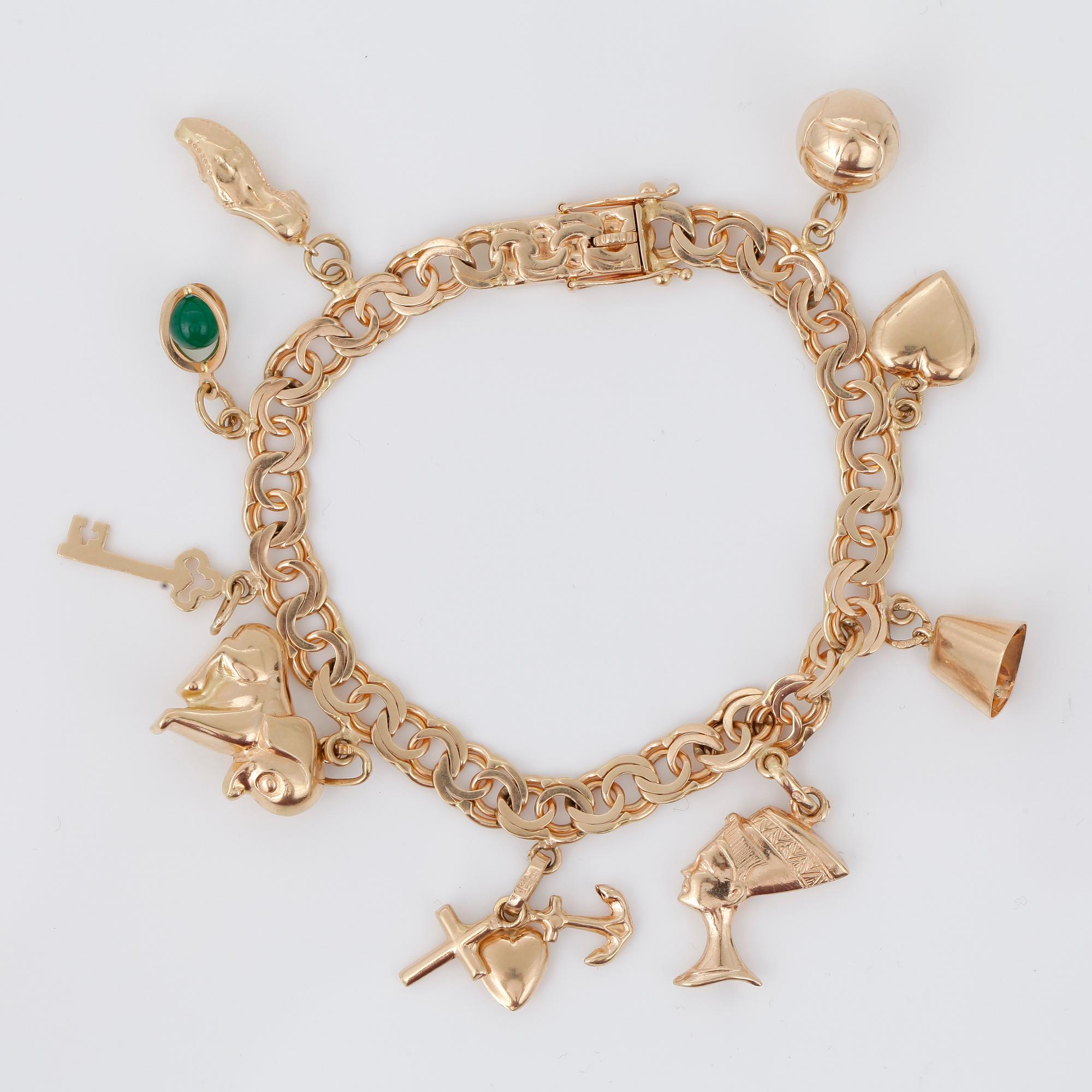 BERLOCKARMBAND, 18 K guld, Gustav Dahlgren & Co, Malmö, 1961. Vikt ca 22 gram.