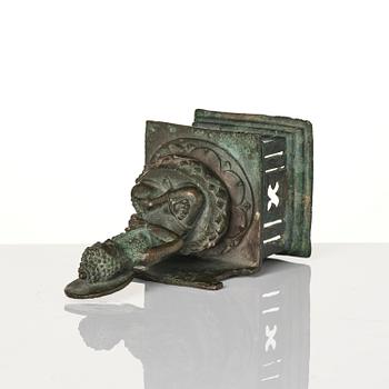 A bronze Buddha Vairocana, Eastern Java, 10th century.