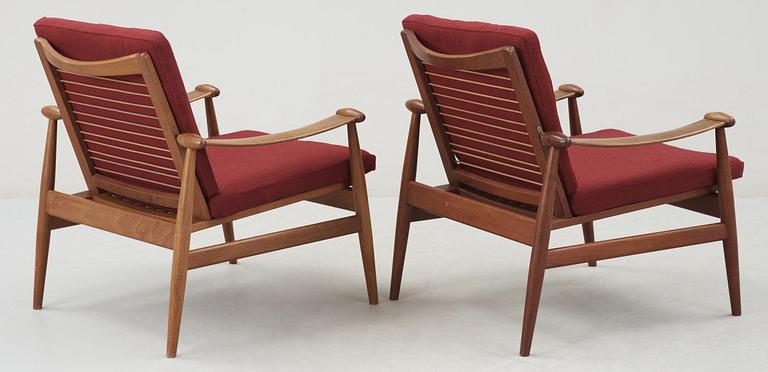 A pair of Finn Juhl teak easy chairs , model 133, France & Son, Denmark.