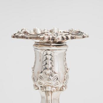 A pair of sterling silver candlesticks, maker's mark of Waterhouse, Hodson & Co, Sheffield 1832.