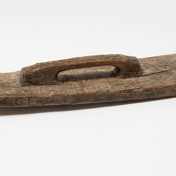 A Swedish folk art mangle board, dated 1666.