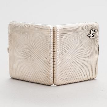 A silver cigarette case, maker's mark of Johan Allenius, Saint Petersburg, Russia 1898.