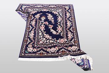 A rug, Esfahan, part silk, signed Davari, ca 197 x 128 cm.