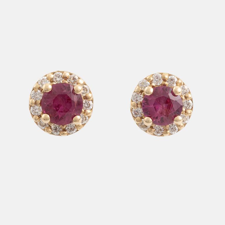 Earrings with rubies and brilliant-cut diamonds.