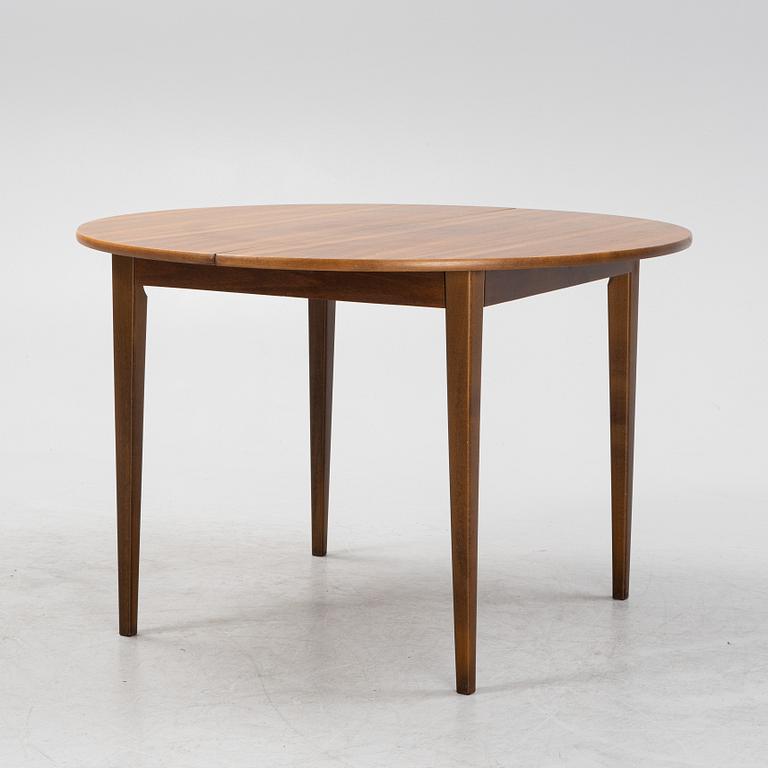 A walnut dining table, 1960's.