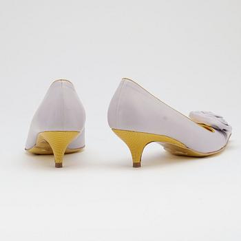 DOLCE & GABBANA, a pair of light purple leather pumps.