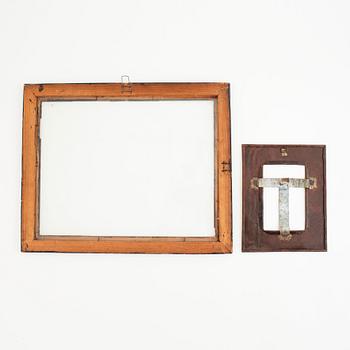 A set of two contemporary metal frames.