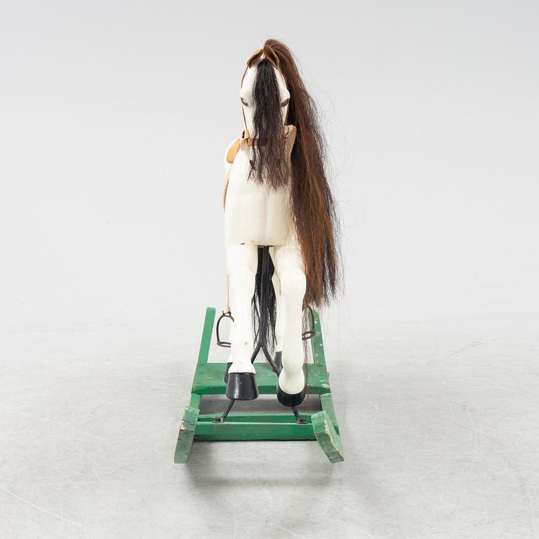 An early 20th century rocking horse.