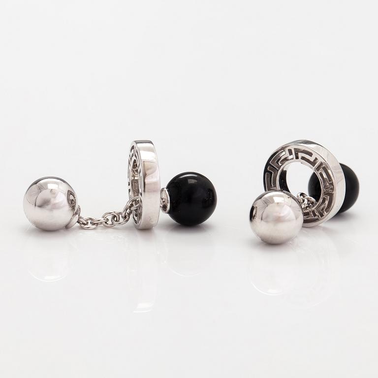 Versace, a pair of 18K white gold cufflinks with black glass pearls. marked Versace.