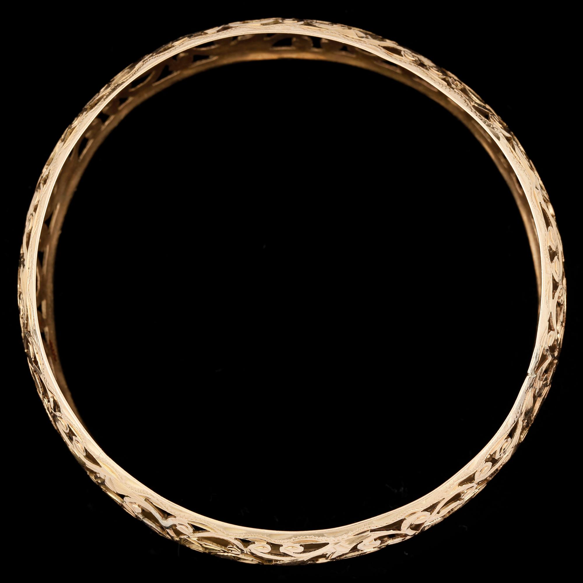 ARMRING, guld 18k, otydlig utländsk stämpel, 1900-tal. Vikt ca 23 gram.