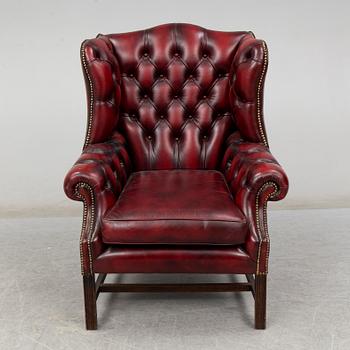 A late 20th Century leather easy chair.